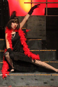 Striking the final pose in her scence cell block tango in the play Chicago junior Maria Pineda .