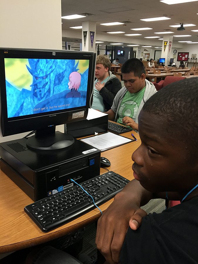 Sophomore watches Naruto during class.